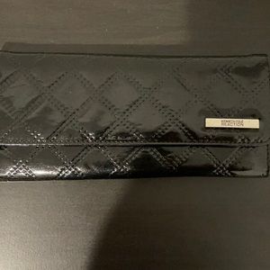 Kenneth Cole reaction clutch